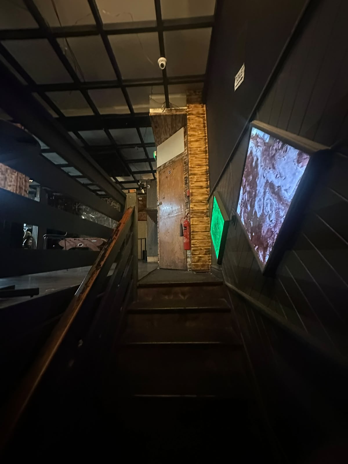 Stairs leading up to the Manna Haus lounge and games floor
